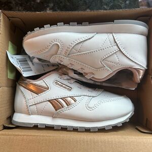 New in original box rose gold Reebok sneakers, toddler size 8